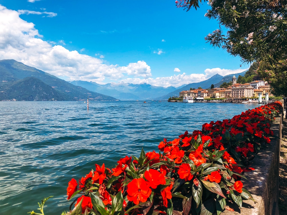Stunning landscape of Bellagio, the Pearl of Lake Como, one of the most famous and picturesque towns in Lombardy, Italy, that boasts unparalleled shoreline and Alpine views, boutique-lined cobblestone streets, Italian villas overlooking the water, and fragrant gardens.