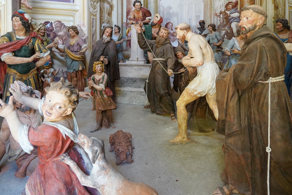 sculptures of people showing a biblical scene at Sacro Monte di Orta