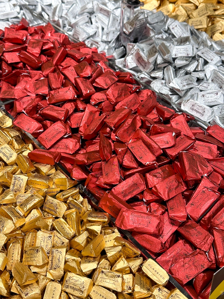 Chocolates wrapped in gold, red, and silver in a Turin Itlaly chocolate shop