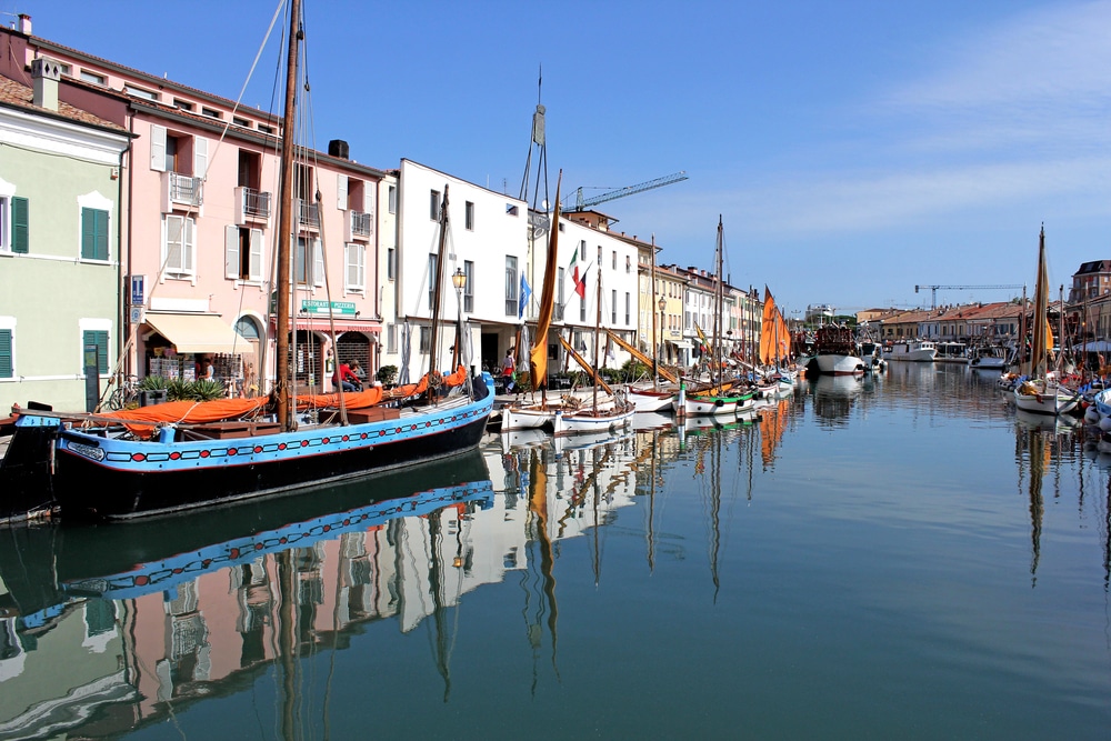 Harbor with houses and boats in Cesenatico Emilia Romagna 
