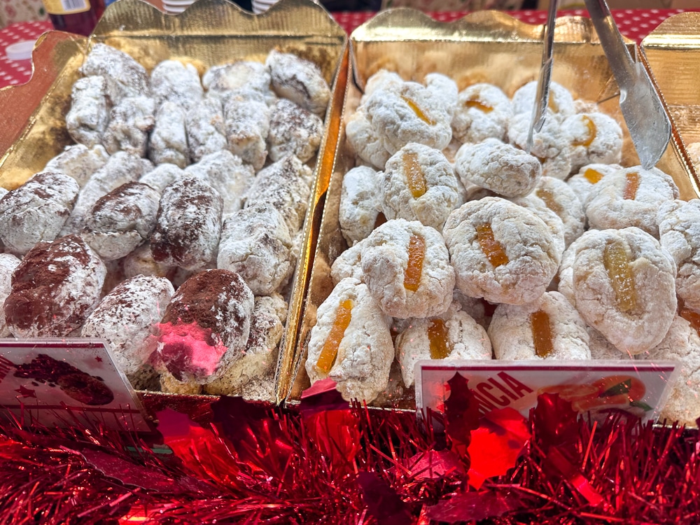 close up of powdered jelly cookies 