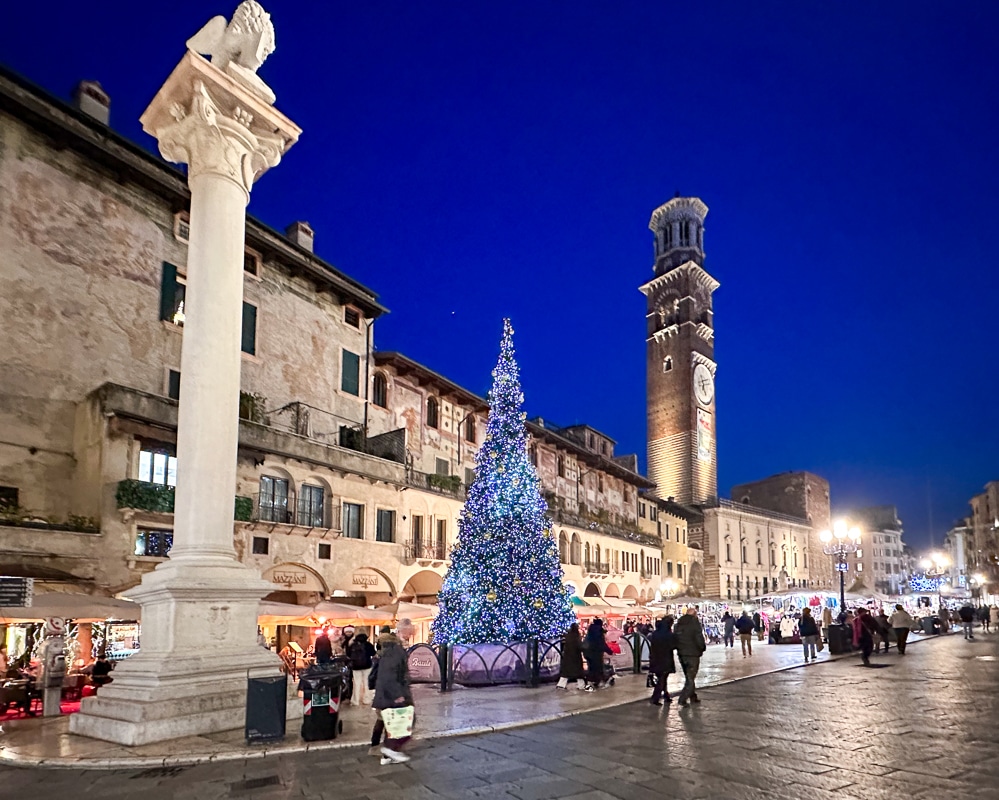 Piazza delle Erbe in Verona Italy at Christmas with a blue Christmas tree
