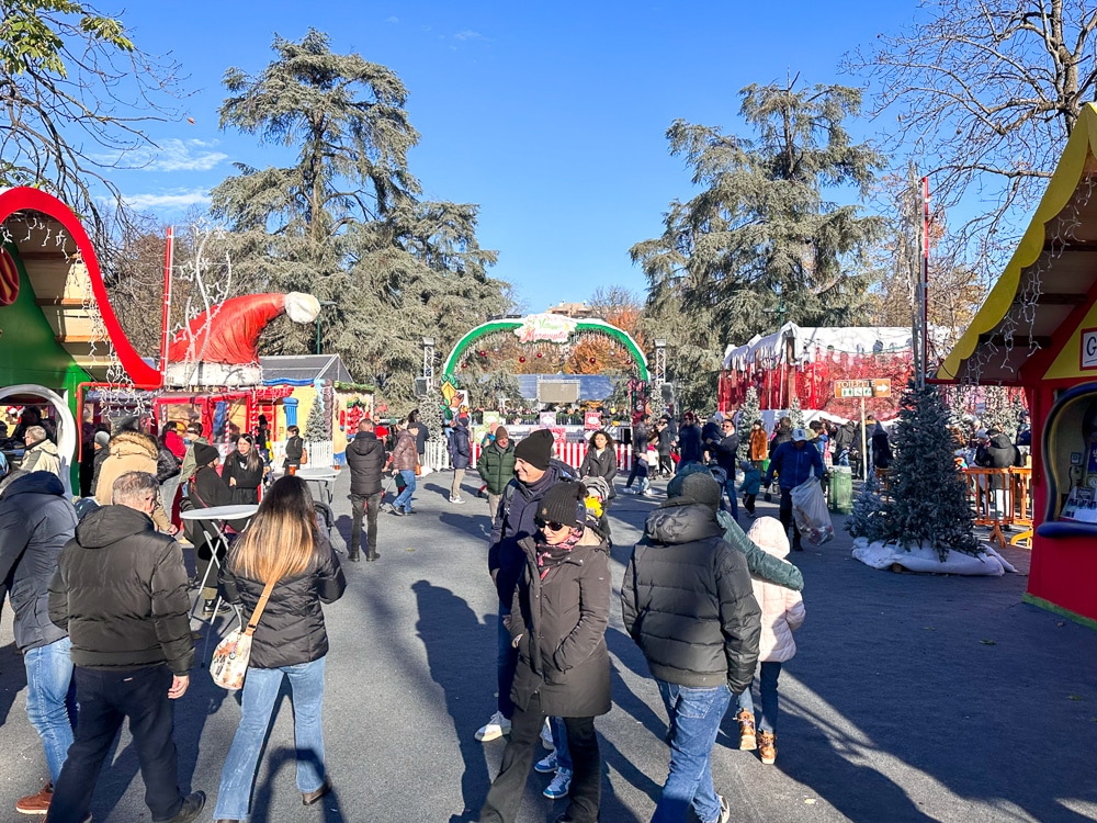 People at a winter village during Christmas in Milan