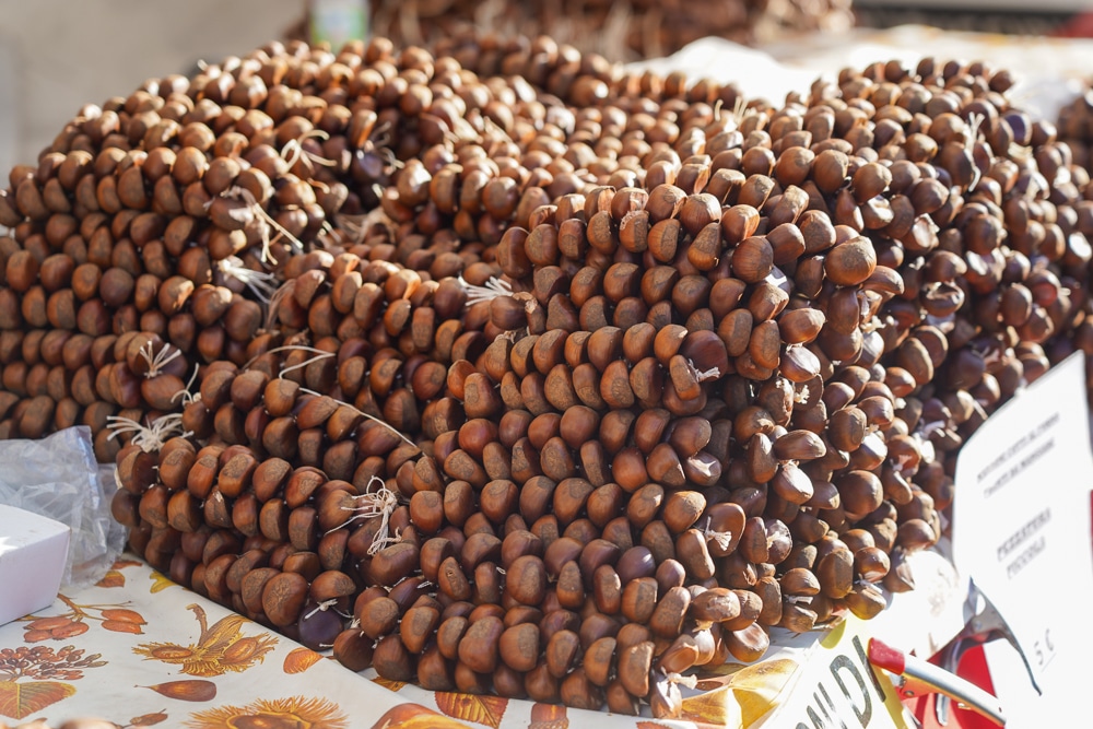 close up of strings of chestnuts in Milan Italy