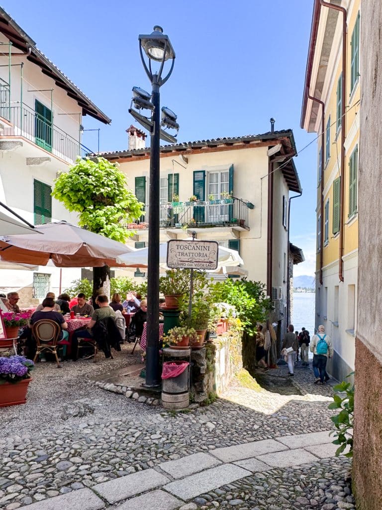 restaurants and an alley leading to the lakefront on Isola Pescatori Lake Maggiore