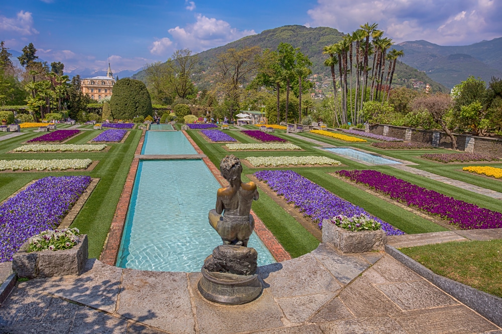 flowers with a shallow pool and statue at Villa Taranto Lake Maggiore
