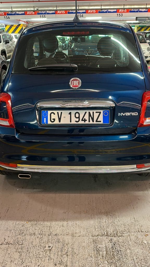fiat rental car in the car rental garage at Malpensa Airport in Milan Italy